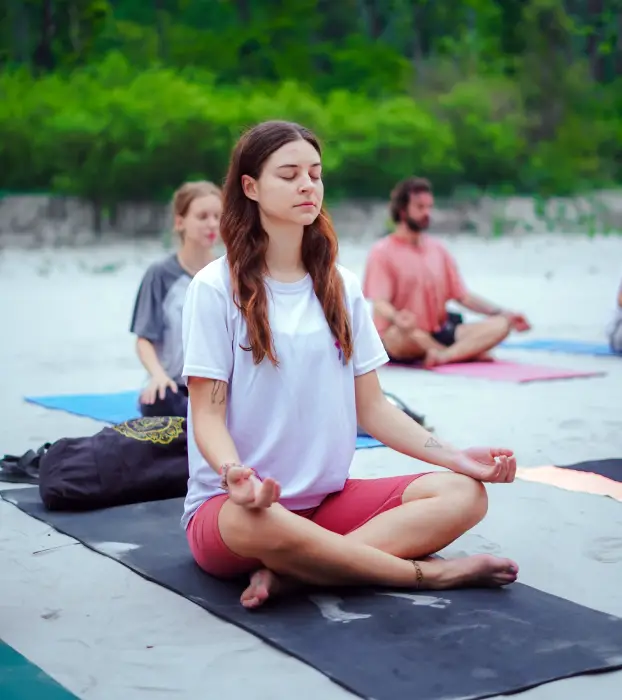 Students sharing experiences during yoga teacher training