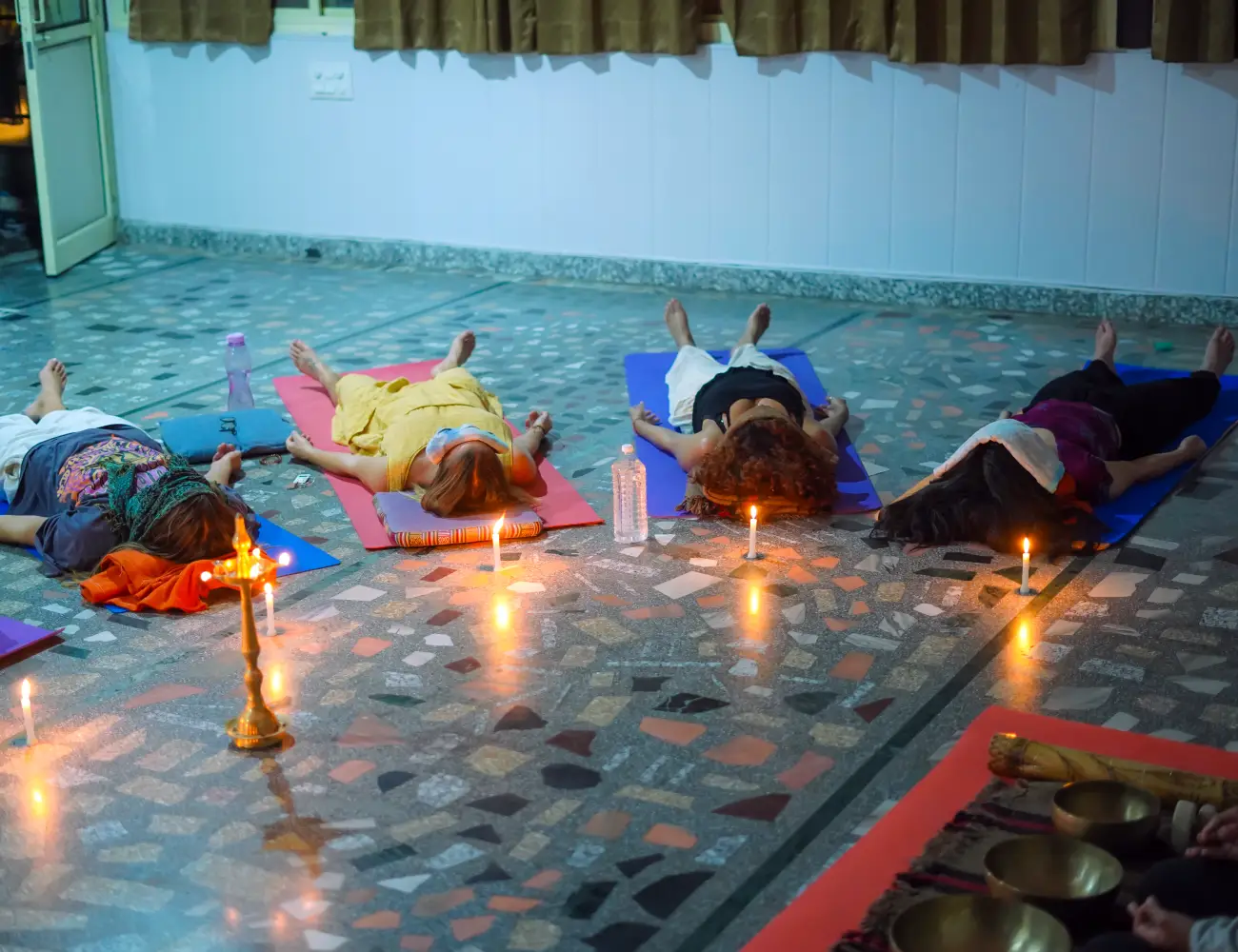 Students practising yoga at 8 Limbs Yoga School