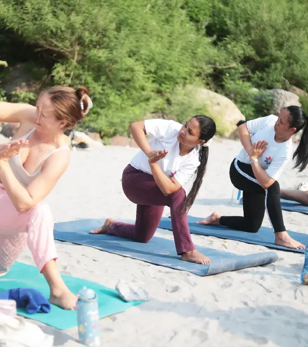 Students practising yoga at 8 Limbs Yoga School