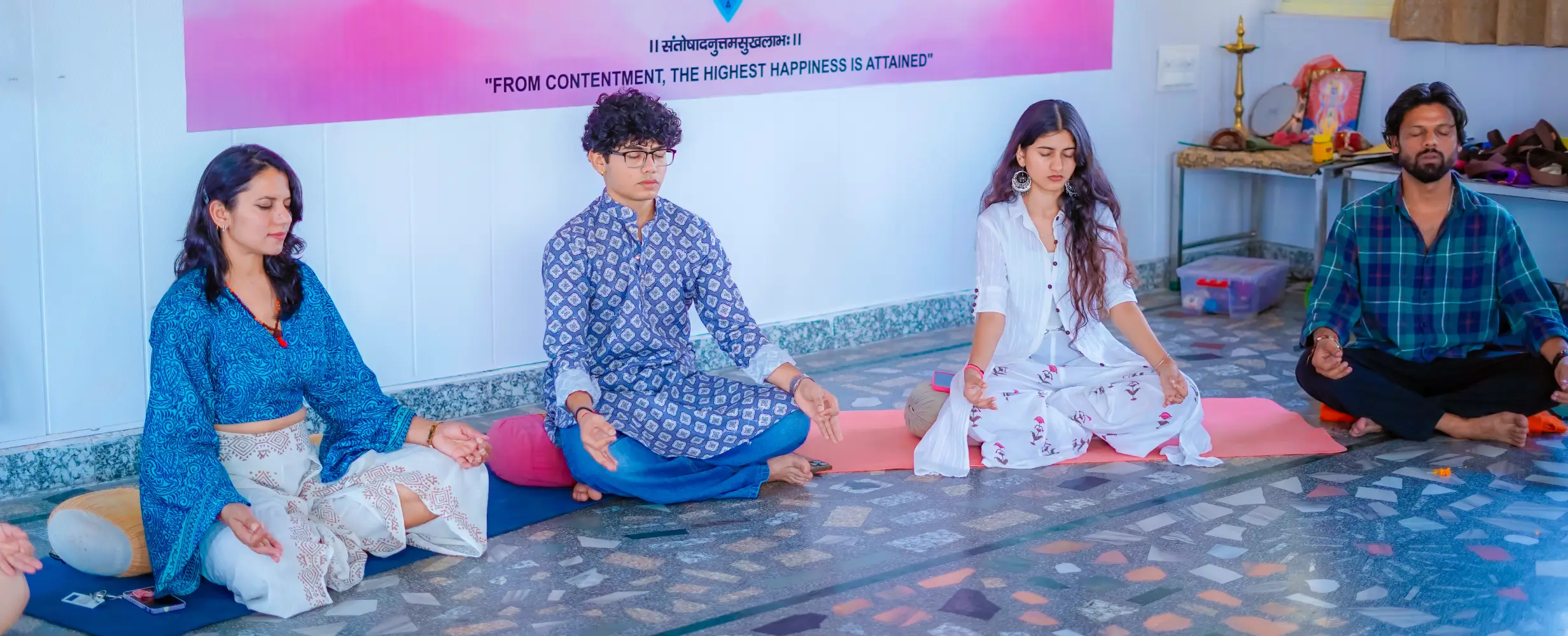 Students practising yoga during a class at 8 Limbs Yoga School in Rishikesh